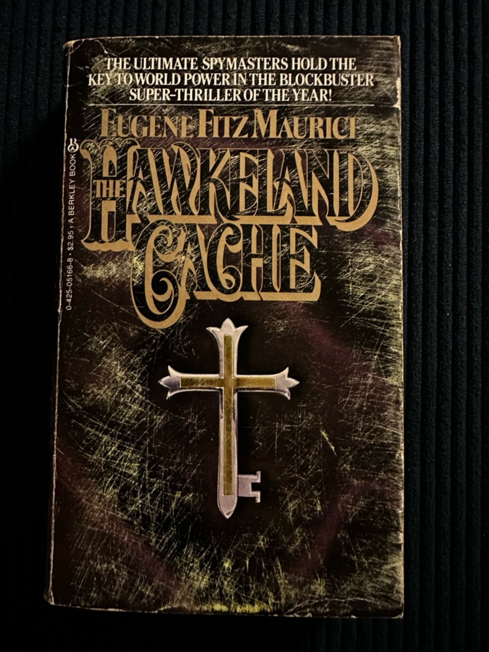 The Hawkeland Cache Paperback - Black and Gold